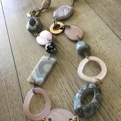 Beautiful stone and shell and acrylic. Beaded statement necklace. Very nice quality,