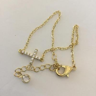 Pretty gold tone cross bracelet