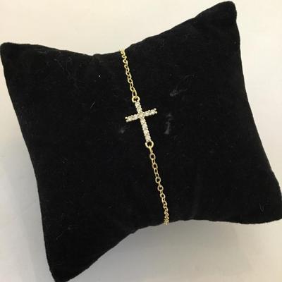 Pretty gold tone cross bracelet