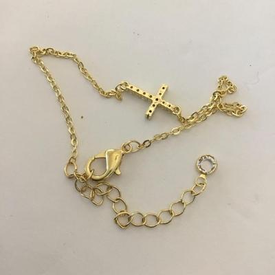 Pretty gold tone cross bracelet