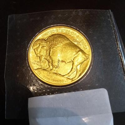 Sale Photo Thumbnail #2: Indian/ Buffalo gold coin. Sealed and uncirculated.