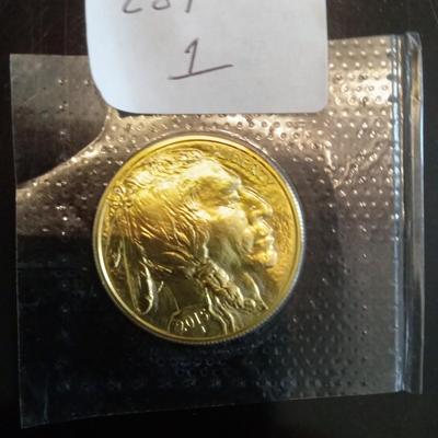 Sale Photo Thumbnail #1: Indian/ Buffalo gold coin. Sealed and uncirculated.