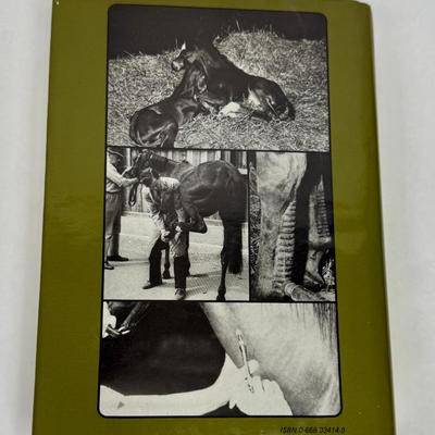 Sale Photo Thumbnail #77: Hardback book with good dust cover. An Equine Veterinary Dictionary, from 1987.