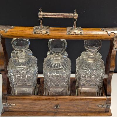 Sale Photo Thumbnail #1311: Whiskey Bottles With Antique Wooden Case