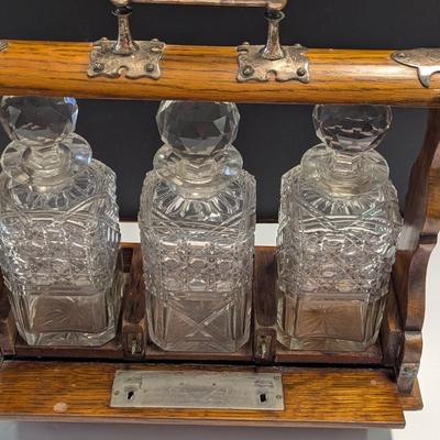 Sale Photo Thumbnail #1312: Whiskey Bottles With Antique Wooden Case