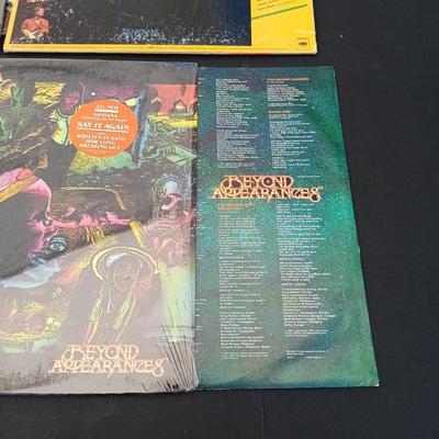 LOT 204: Collection of Santana and Eagles Vinyl