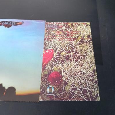 LOT 204: Collection of Santana and Eagles Vinyl