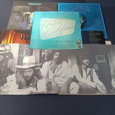 LOT 204: Collection of Santana and Eagles Vinyl