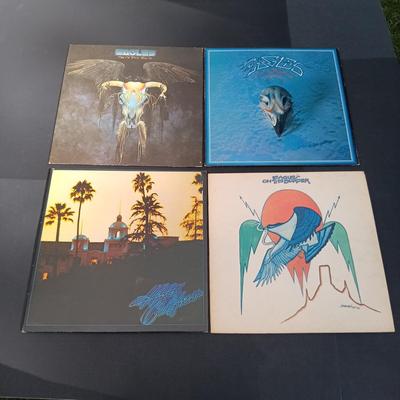 LOT 204: Collection of Santana and Eagles Vinyl