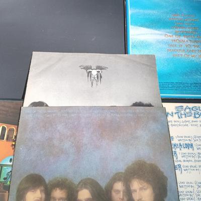LOT 204: Collection of Santana and Eagles Vinyl