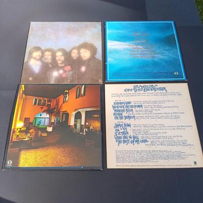 LOT 204: Collection of Santana and Eagles Vinyl