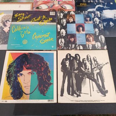 LOT 212: Vintage Albums - Kiss, Inxs, David Lee Roth, Def Leppard and More