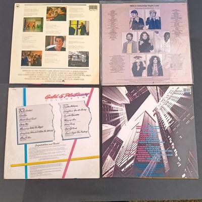 LOT 214: Collection of Movie / TV Soundtrack Albums - Saturday Night Fever, Flash Dance, Monty Python, Beverly Hills Cop and More