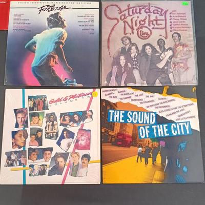 LOT 214: Collection of Movie / TV Soundtrack Albums - Saturday Night Fever, Flash Dance, Monty Python, Beverly Hills Cop and More
