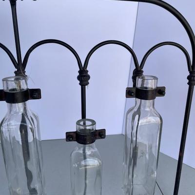 Black Iron Wall Decor with Glass Bottles