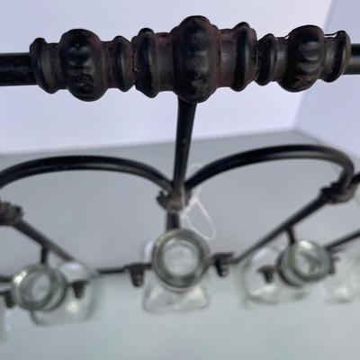Black Iron Wall Decor with Glass Bottles