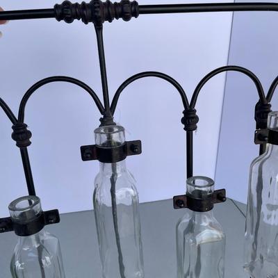Black Iron Wall Decor with Glass Bottles