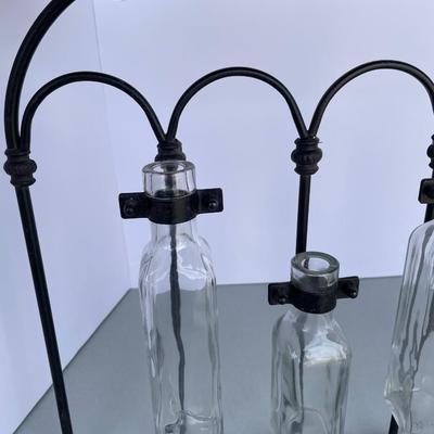 Black Iron Wall Decor with Glass Bottles