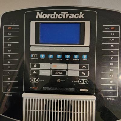 Sale Photo Thumbnail #10: NordicTrack C 950 Pro treadmill featuring a digital display with iFit compatibility. Includes speed and incline controls, multiple workout modes, and handgrip heart rate sensors. Designed with a durable belt and sturdy frame, suitable for home exercise. E
