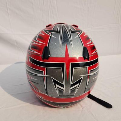 Sale Photo Thumbnail #44: HJC CL-XY1 motocross helmet featuring bold red and black graphic designs. Size XL, constructed for motocross and off-road use. Includes a visor for sun protection, interior padding for comfort, and a durable outer shell. Appears in good condition with no 