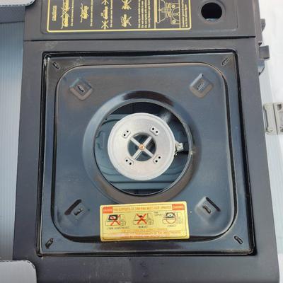 Sale Photo Thumbnail #61: Home Power HP-1000 portable butane gas range from the Total Kitchen Collection. Features a durable metal body with a gas burner and adjustable flame control dial. Includes a hard plastic carrying case for easy portability and storage. Designed for outdoor