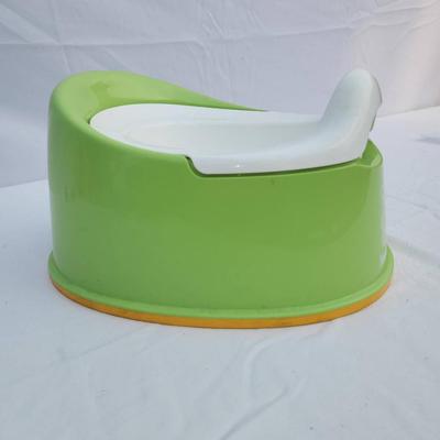 Sale Photo Thumbnail #68: BabyBjorn potty chair in green and white, made from durable, easy-to-clean plastic. Features a removable insert for easy cleaning and a non-slip base for stability. Includes a supportive backrest for added comfort. Designed for toddlers and small children