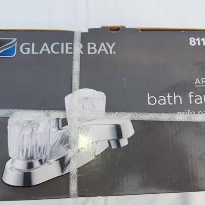 Sale Photo Thumbnail #78: Glacier Bay Aragon 2-handle bath faucet in a chrome finish, model 811 530. Features a 4-inch centerset design and a click-install drain assembly for easy installation. Includes a washerless cartridge and comes with a limited lifetime warranty. The faucet 