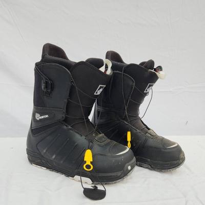 Sale Photo Thumbnail #107: Burton Moto snowboard boots in black, size US 13 (UK 11.5, EUR 46.5, JPN 30.5). Features include yellow pull-tab lacing system for easy tightening and adjustment. Designed for snowboarding activities. Pre-owned condition with visible wear, particularly on