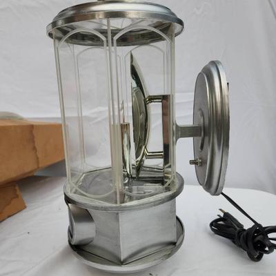 Sale Photo Thumbnail #125: Michelob Light promotional hanging lantern-style light featuring a chrome body with glass panels, an internal candle-shaped bulb, and branded 'Michelob Light' signage. Includes original packaging. Designed as a decorative electric light fixture. In good c