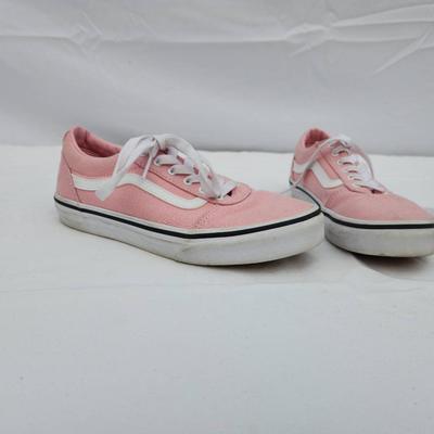 Sale Photo Thumbnail #135: Pink canvas low-top sneakers featuring white laces and side detailing. The shoes have a white rubber outsole with a black stripe for accent. The interior is designed for comfort, with a pink lining. Moderate wear is visible, suitable for casual use. Size 