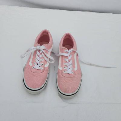 Sale Photo Thumbnail #136: Pink canvas low-top sneakers featuring white laces and side detailing. The shoes have a white rubber outsole with a black stripe for accent. The interior is designed for comfort, with a pink lining. Moderate wear is visible, suitable for casual use. Size 