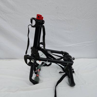 Sale Photo Thumbnail #139: Allen Sports Model 102DN 2-Bike Trunk Mount Rack constructed with a durable steel frame. Features a compact and foldable design for convenient storage, along with adjustable tie-down straps for securely holding up to two bicycles. Includes foam padding to