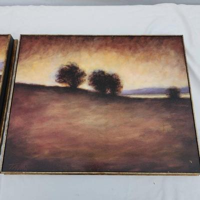 Sale Photo Thumbnail #152: Landscape paintings by artist Taino, depicting sunset scenes with trees in the foreground. Each painting is completed in warm, earthy tones and framed with simple gold-colored frames. Both are signed 'Taino' in the lower left-hand corner. The paintings ar