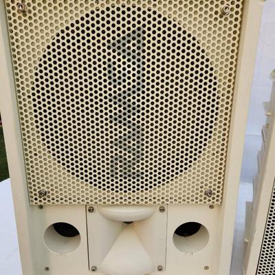 Sale Photo Thumbnail #219: Three white Panasonic speaker systems, model WA-260-MW. Includes two larger speakers and one smaller unit, all featuring mesh grills and labeled with parallel input options. Some signs of wear or discoloration may be present. Suitable for professional or 