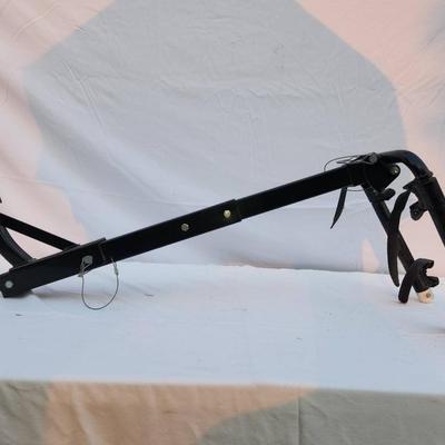 Sale Photo Thumbnail #222: Allen Sports 522RR hitch-mounted bike rack designed for carrying up to two bicycles. Compatible with 1 1/4-inch and 2-inch receiver hitches. Made of durable steel with a black finish, featuring a secure tie-down system. Shows signs of prior use, including