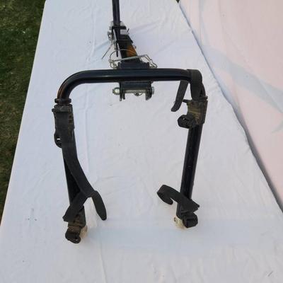 Sale Photo Thumbnail #224: Allen Sports 522RR hitch-mounted bike rack designed for carrying up to two bicycles. Compatible with 1 1/4-inch and 2-inch receiver hitches. Made of durable steel with a black finish, featuring a secure tie-down system. Shows signs of prior use, including