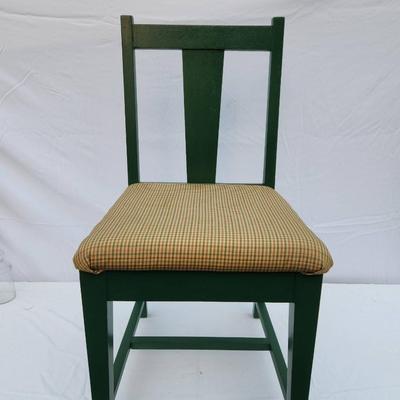 Sale Photo Thumbnail #251: Six wooden dining chairs, painted green, featuring a simple slat-back design. Each chair includes an upholstered seat covered in a checked beige fabric. Overall construction appears sturdy, and the upholstery is consistent across all chairs. Ideal for din