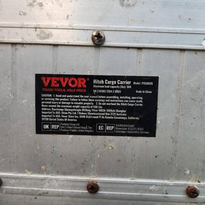 Sale Photo Thumbnail #269: Vevor hitch cargo carrier made from durable aluminum with a 60-inch platform. Designed for vehicles with a standard 2-inch receiver, this cargo carrier features a lightweight, corrosion-resistant frame with reflective elements for safety. Suitable for tra
