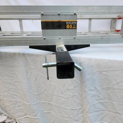 Sale Photo Thumbnail #268: Vevor hitch cargo carrier made from durable aluminum with a 60-inch platform. Designed for vehicles with a standard 2-inch receiver, this cargo carrier features a lightweight, corrosion-resistant frame with reflective elements for safety. Suitable for tra
