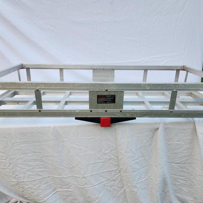 Sale Photo Thumbnail #270: Vevor hitch cargo carrier made from durable aluminum with a 60-inch platform. Designed for vehicles with a standard 2-inch receiver, this cargo carrier features a lightweight, corrosion-resistant frame with reflective elements for safety. Suitable for tra