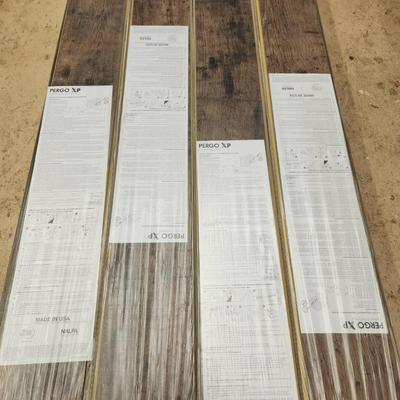 Sale Photo Thumbnail #271: Pergo XP laminate flooring in Rustic Grey Oak finish, model LF000821. Includes 8 planks covering 20.25 sq ft. Designed with durable wear and scratch-resistant surfaces. Suitable for residential and commercial use. Additional installation and care instruct