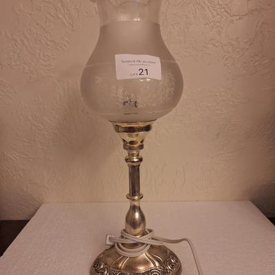 brass and glass lamp