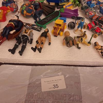 action figure and other toy bundle