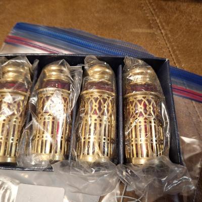 Brass and red glass salt and pepper shakers