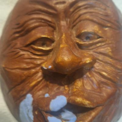 home made pottery of face