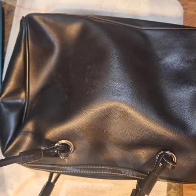 Black handbag or purse with shoulder strap