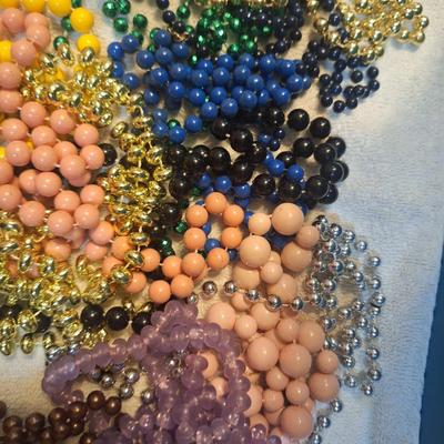 several jewelry strands of beads