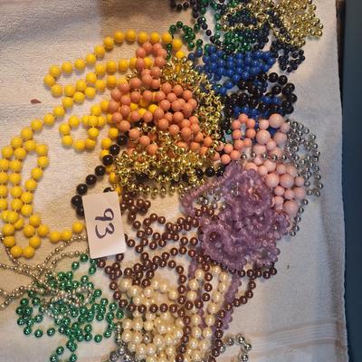 several jewelry strands of beads