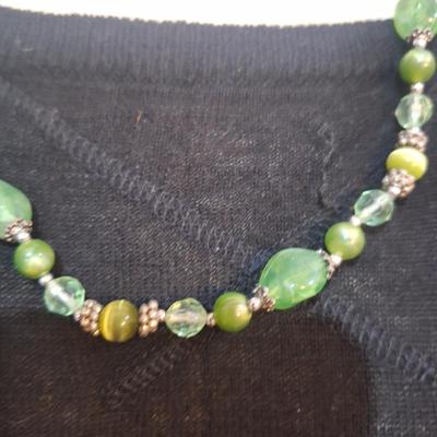 beaded necklace with greens, silver and clear beads