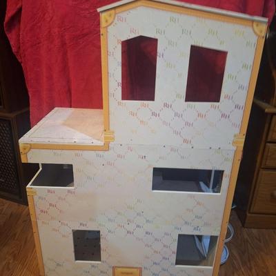 Rainbow house doll house and a few dolls see photos